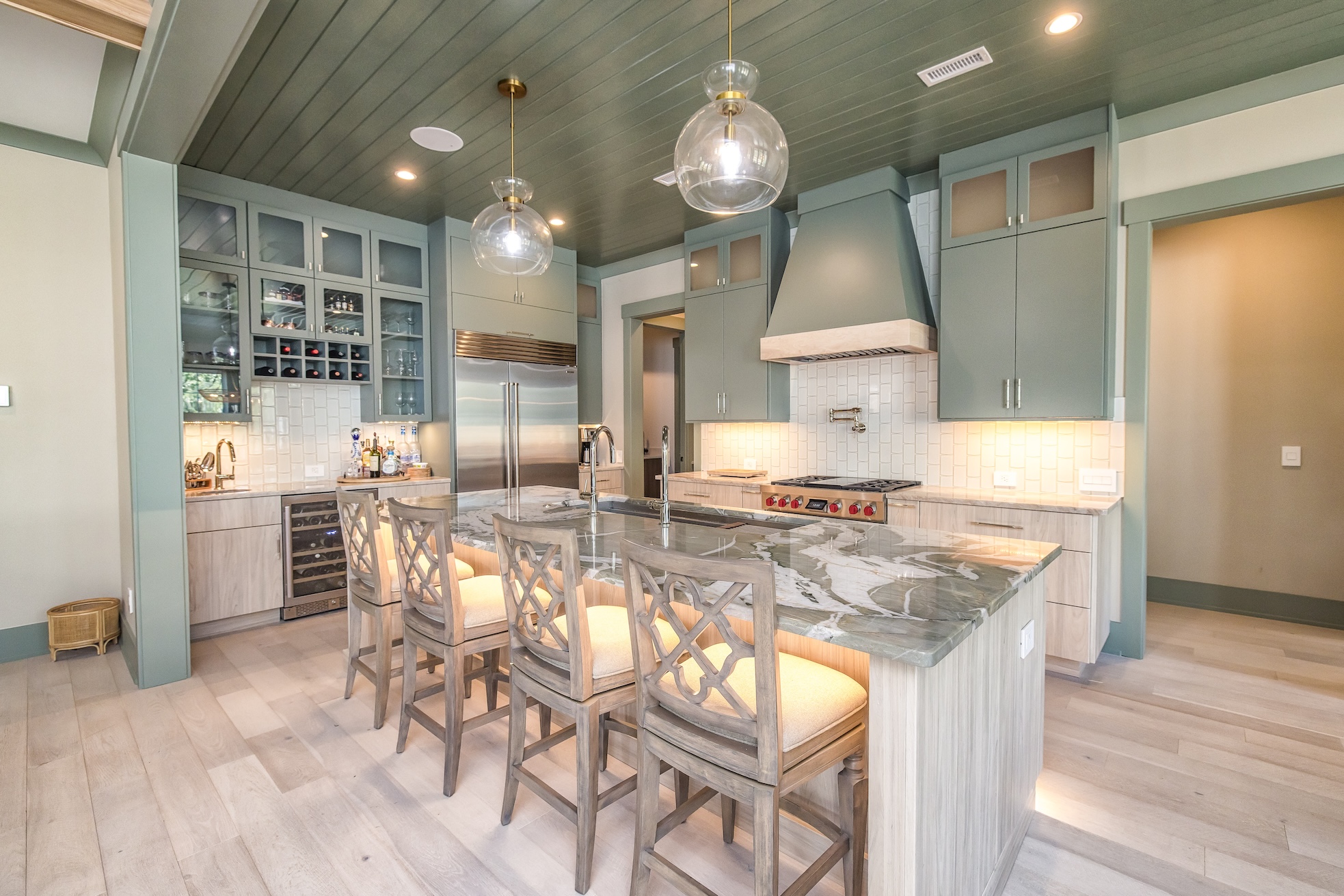 Custom-built kitchen, green cabinets and paint