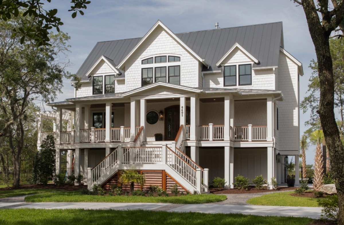 Three story white house, double entrance porch