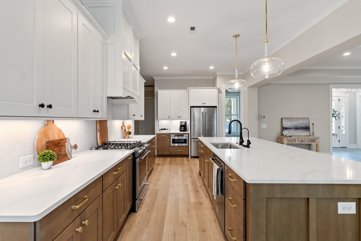 Custom built kitchen, white countertops and white cabinets